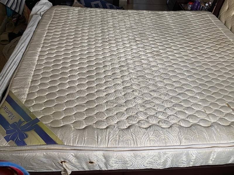 king bed with 2 side tables and mattress 4
