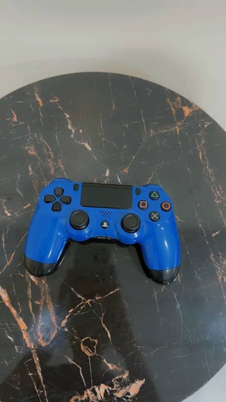 PLAYSTATION 4 with two controllers 6