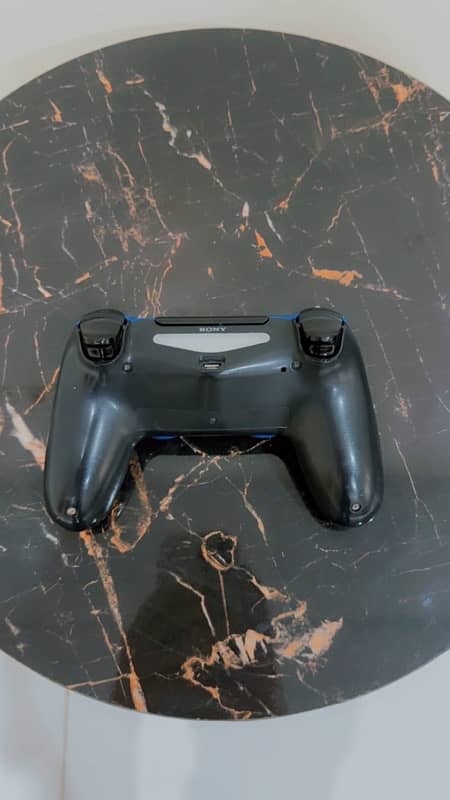 PLAYSTATION 4 with two controllers 7