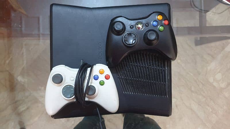 Xbox 360 slim 250gb with 2 controllers and 30 games pre installed 2