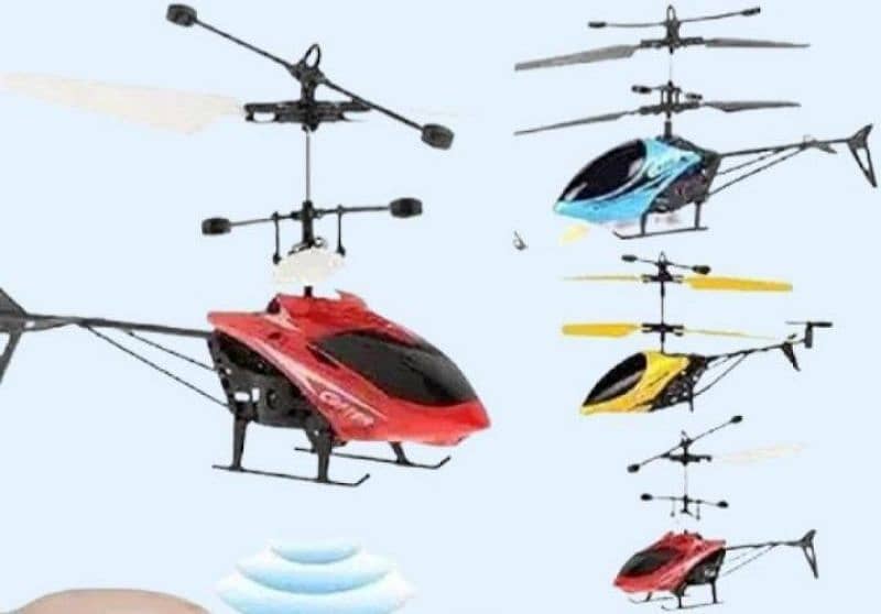 REMOTE CONTROL AND HAND SENSOR HELICOPTER (HOME DELIVERY) READ DESCRIP 2