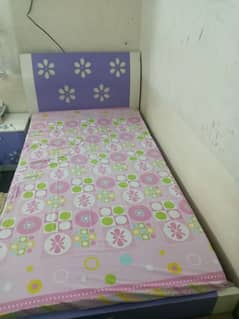 2 single beds with 3 door cupboard