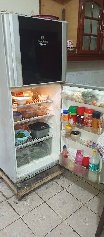 Dawlance  fridge with stabilizer stand 1