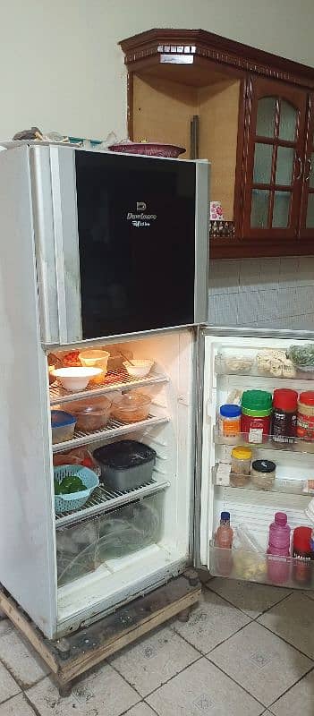 Dawlance  fridge with stabilizer stand 3