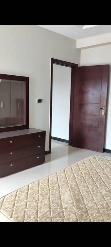 A Prime Location 2 Bed Furnished Apartment With Boulevard Facing Is Available With All Facilities. 16