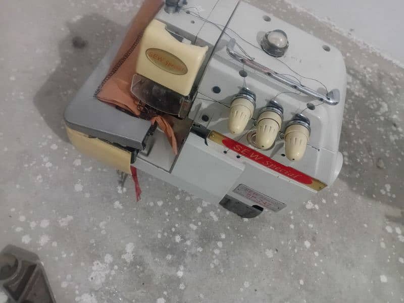 overlock machine, singer, flate machine with stands phn:03026515011 6