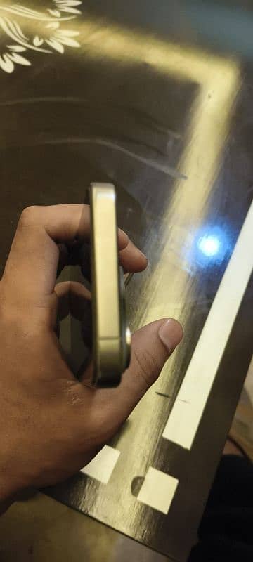 15 pro natural titanium colour 256 GB condition 10 by 10 0
