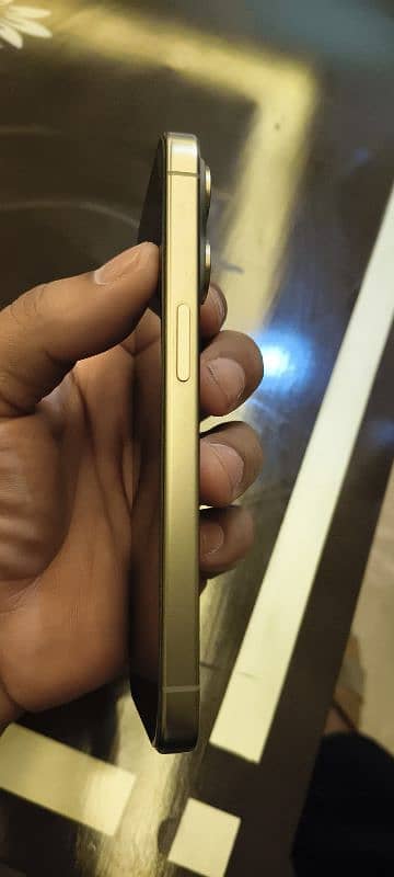 15 pro natural titanium colour 256 GB condition 10 by 10 1
