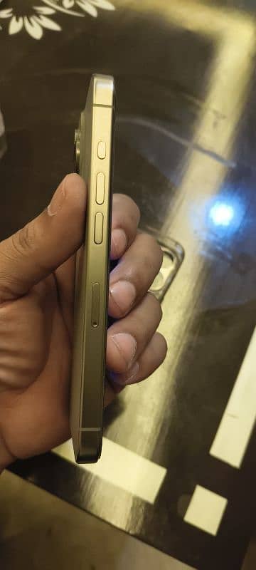 15 pro natural titanium colour 256 GB condition 10 by 10 3