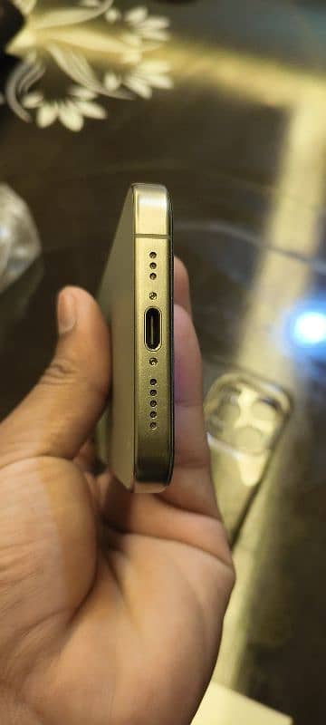 15 pro natural titanium colour 256 GB condition 10 by 10 4