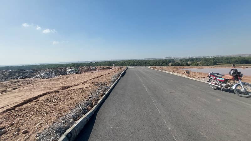 5 Marla Possession Able Plot Back To Main Expressway | Prime Location In N Block, Bahria Town Phase 8 1
