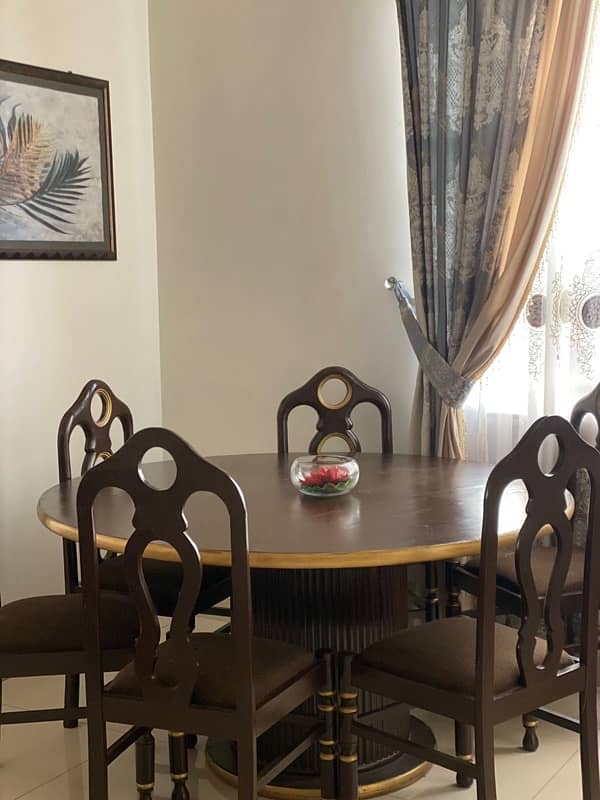 6 chairs dining table newly polished. 1