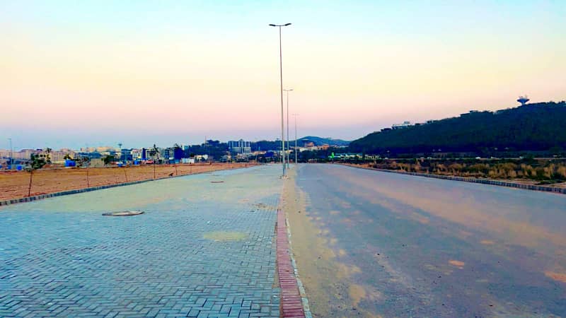 Best Location 1 kanal plot Available For Sale at Main Link Road DHA Phase 4 Islamabad 10