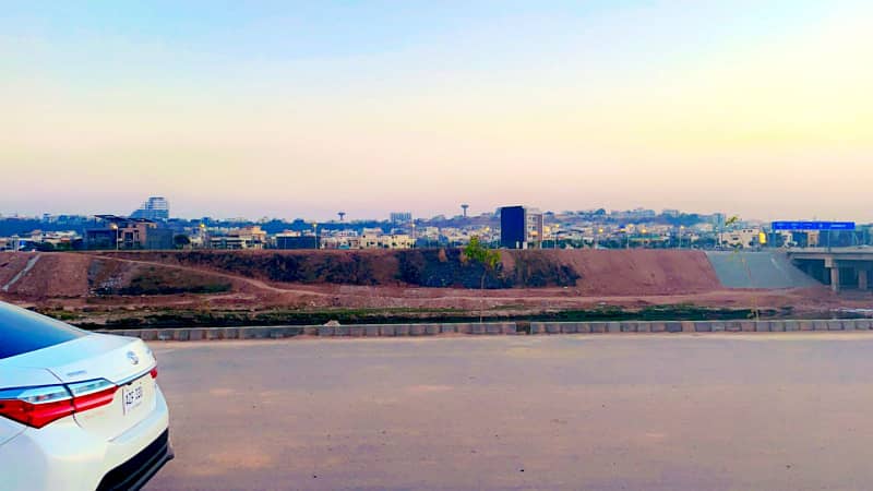 Best Location 1 kanal plot Available For Sale at Main Link Road DHA Phase 4 Islamabad 15
