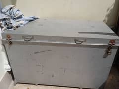 slightly used iron trunk