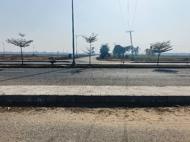 CORNER 1 KANAL PLOT IN DHA PHASE 9 PRISM FOR SALE BLOCK F 2