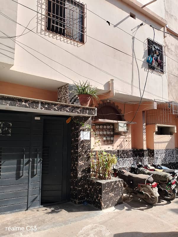 Home for sale 180 SY Ground + 3 RCC Building Rafi Bungalows. Leased , West Open, Corner Rent Value 1.7 Lacs. 13 KE Meters, 3 Gas Meters, 3 Water Tanks. 1