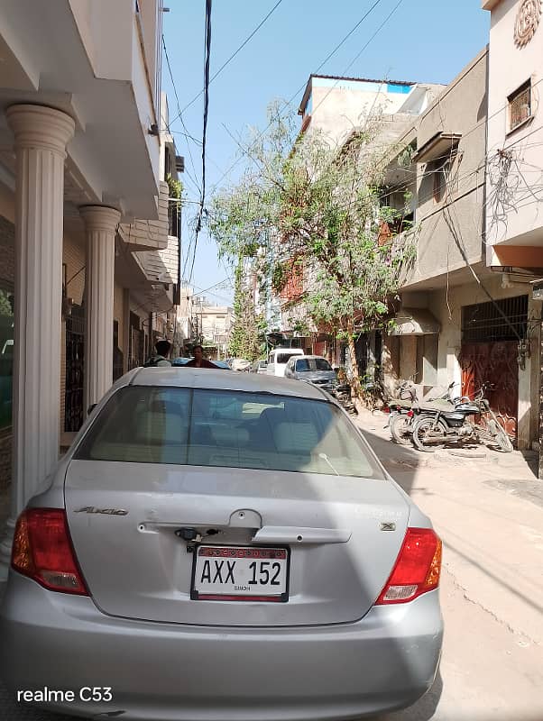 Home for sale 180 SY Ground + 3 RCC Building Rafi Bungalows. Leased , West Open, Corner Rent Value 1.7 Lacs. 13 KE Meters, 3 Gas Meters, 3 Water Tanks. 6