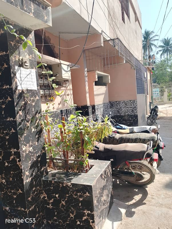 Home for sale 180 SY Ground + 3 RCC Building Rafi Bungalows. Leased , West Open, Corner Rent Value 1.7 Lacs. 13 KE Meters, 3 Gas Meters, 3 Water Tanks. 10