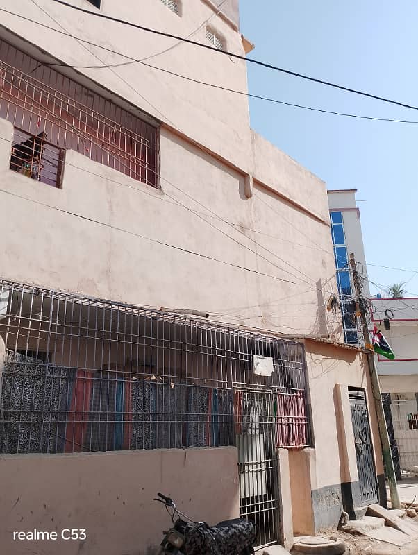 Home for sale 180 SY Ground + 3 RCC Building Rafi Bungalows. Leased , West Open, Corner Rent Value 1.7 Lacs. 13 KE Meters, 3 Gas Meters, 3 Water Tanks. 11