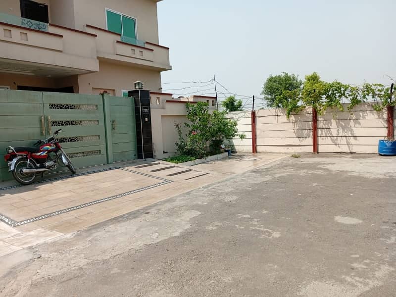 Looking For A Prime Location House In Aziza Housing Scheme 6