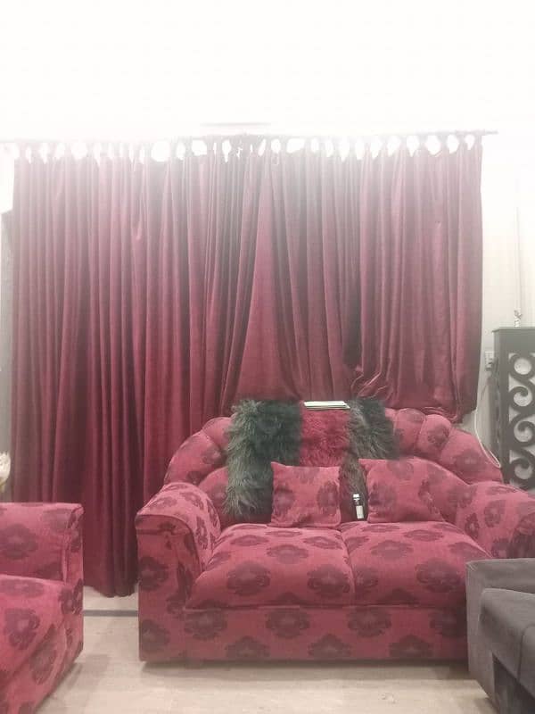 red CLR sofa set with curtain 0