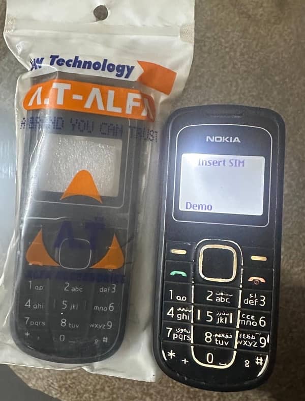 Nokia 1202-2 Black for Sell with Extra Casing / Battery 5