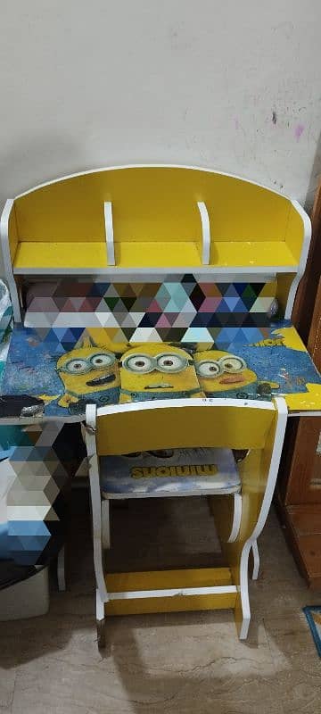 study table with drawer and a chair 0