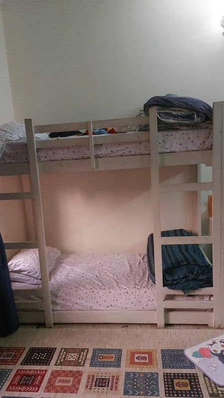 wooden bunk bed with mattresses 0
