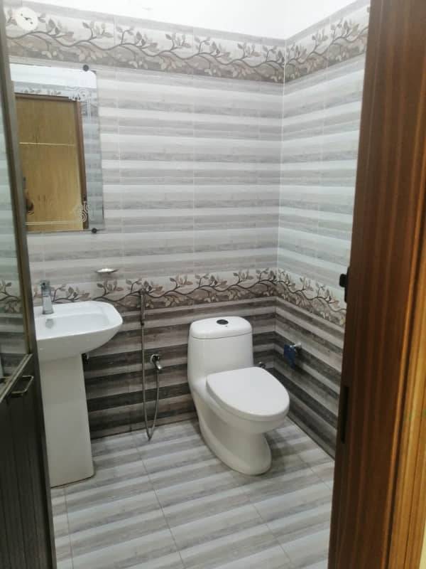 8 MARLA UPPER PORTION IS AVAILABLE FOR RENT IN DHA RAHBAR SECTOR 1 WITH SEPERATE ENTRANCE 15