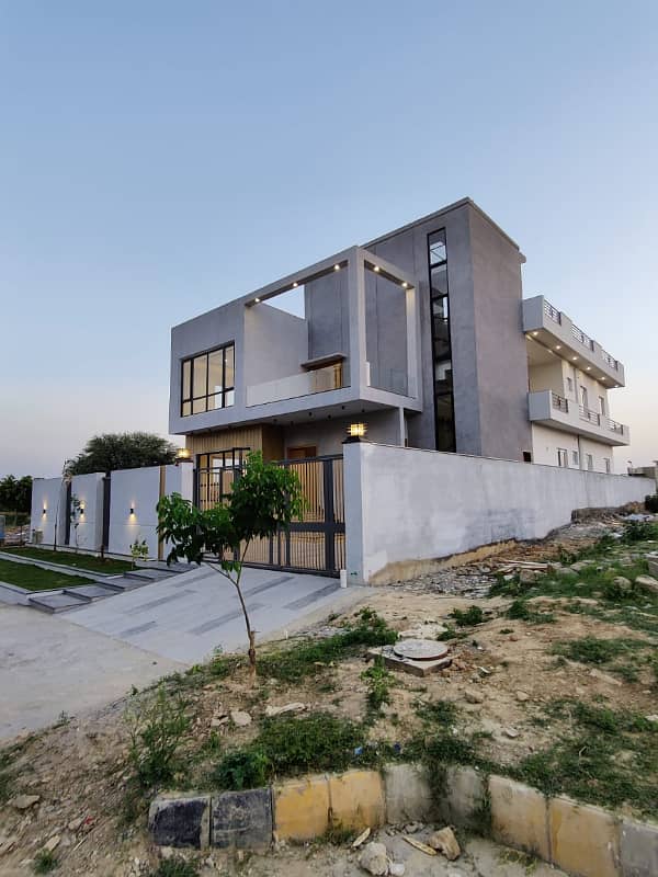 1 Kanal Tripple Story Designer House Available. For Sale in Multi Gardens MPCHS. B-17 Block C Islamabad. 1
