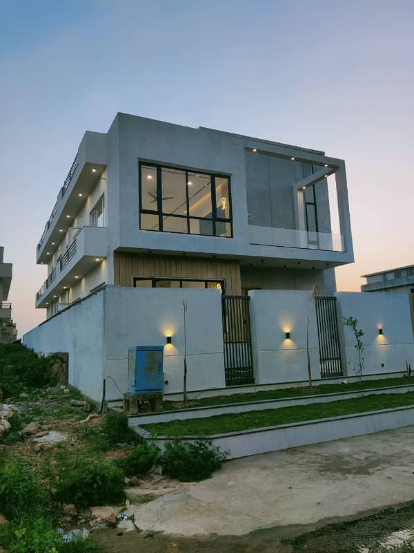 1 Kanal Tripple Story Designer House Available. For Sale in Multi Gardens MPCHS. B-17 Block C Islamabad. 2