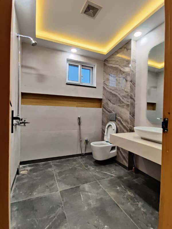 1 Kanal Tripple Story Designer House Available. For Sale in Multi Gardens MPCHS. B-17 Block C Islamabad. 18