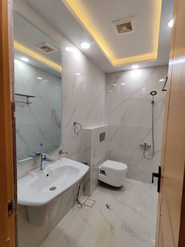 1 Kanal Tripple Story Designer House Available. For Sale in Multi Gardens MPCHS. B-17 Block C Islamabad. 28