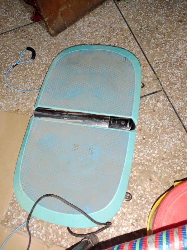 treadmill machine or massage machineperfect condition home used 1