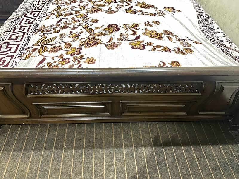 king size bed with side tables and dressing table 0
