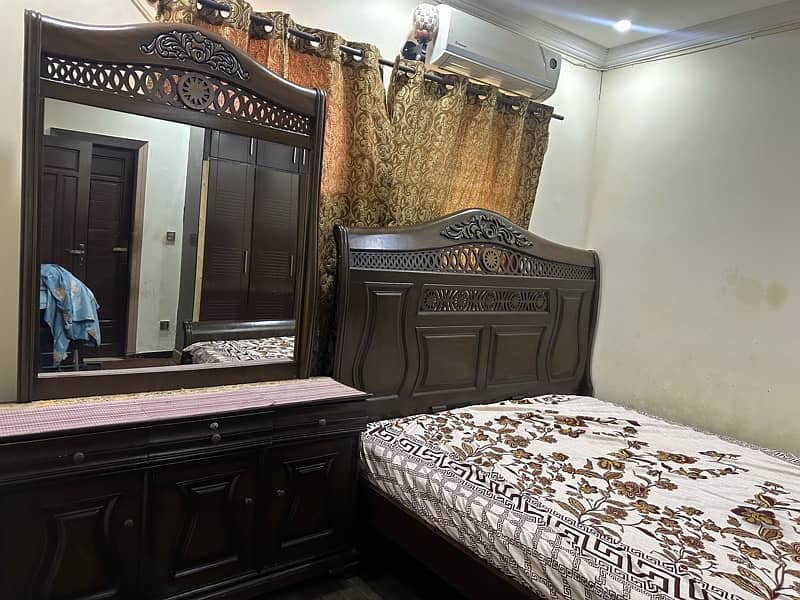 king size bed with side tables and dressing table 1