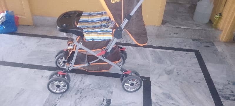 kids pram in excellent condition is for sale 4