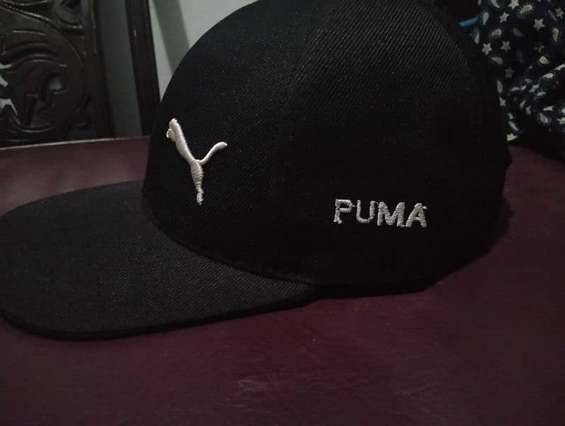 Black Cap written Puma 5