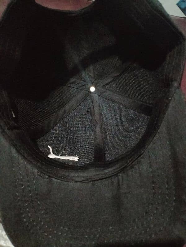 Black Cap written Puma 8