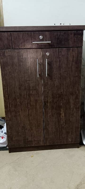 beautiful wardrobe with three shelves in slightly used condition 1