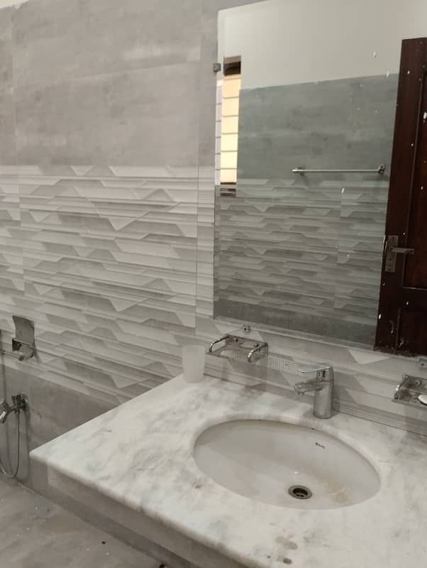 18 Marla Brand New Lock Option Lower lock Upper Portion Available with Gas Original pictures Attached Available For Rent in the Heart of bahria town lahore 10