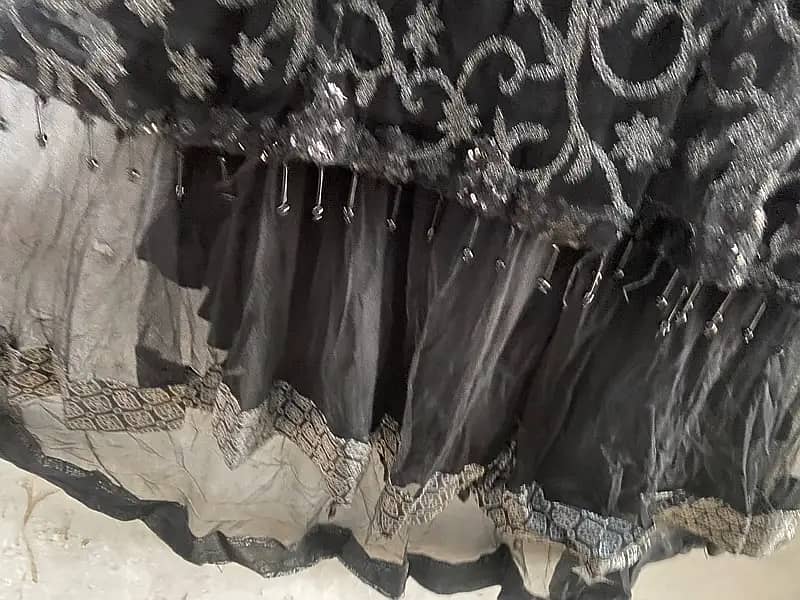 Black net lehnga and long frock… 3