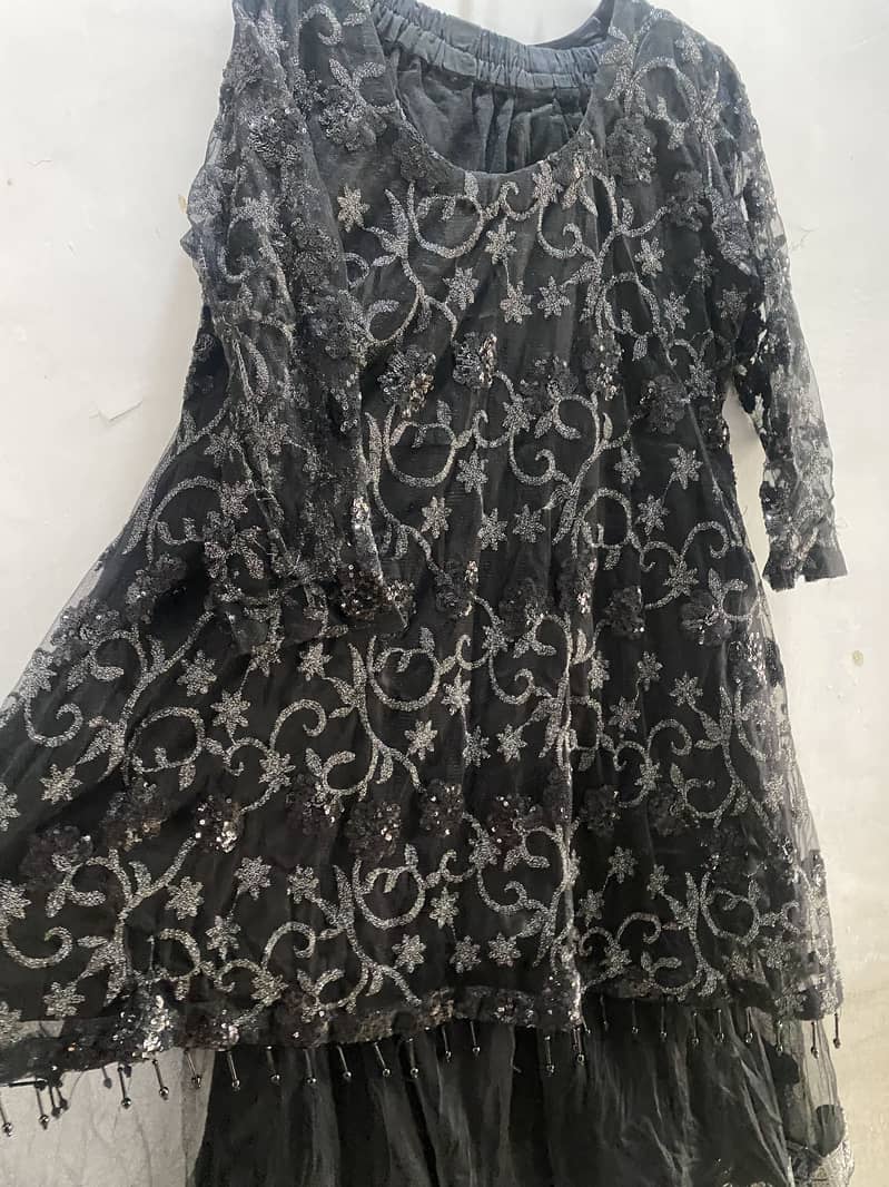 Black net lehnga and long frock… 6