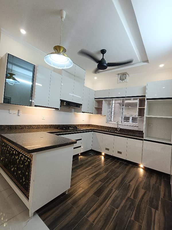 10 Marla Brand New Designer House Available For Rent 17