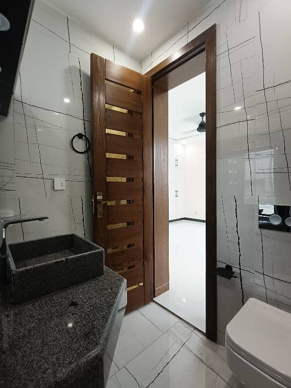 10 Marla Brand New Designer House Available For Rent 18