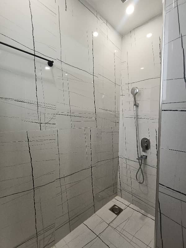 10 Marla Brand New Designer House Available For Rent 19
