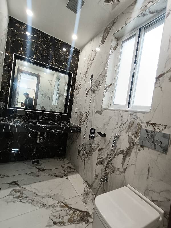 10 Marla Brand New Designer House Available For Rent 23
