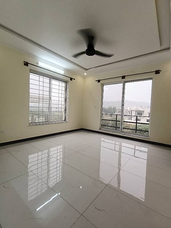 10 Marla Brand New Designer House Available For Rent 26