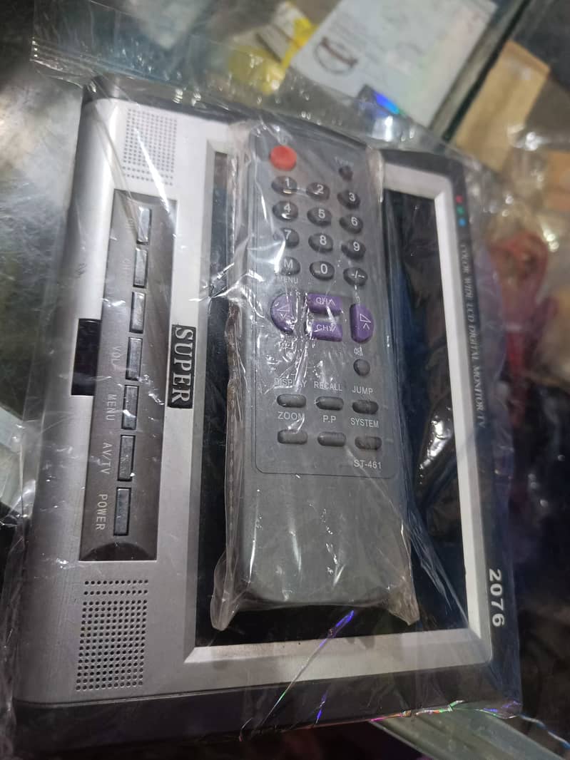 10 inch lcd 12 volt  . with rimot and adopter 4